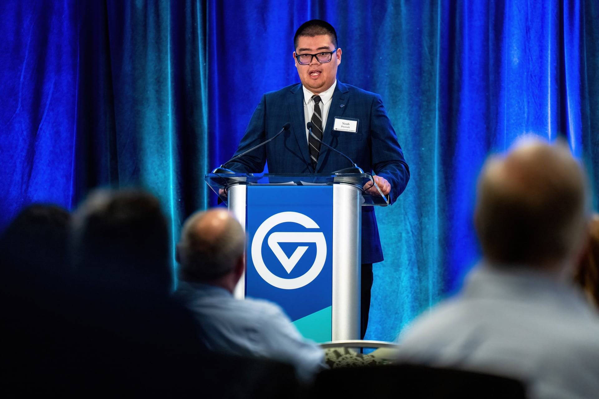 Noah Prysock speaking at MI Listens event